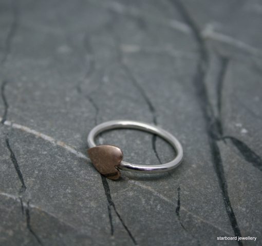 Copper heart on sterling silver ring
