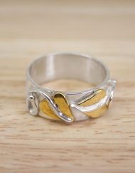 Sterling silver ring with brass detail