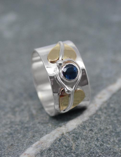 Sterling silver and sapphire ring with brass leaves