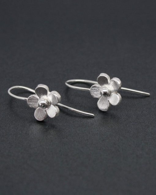 Silver flower earrings on hook fittings