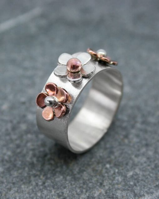 Three flower ring in silver and copper