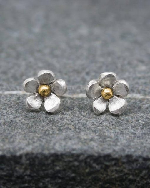 Handmade silver and brass flower stud earrings