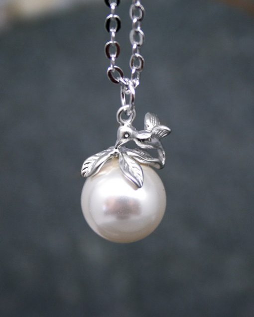 Pearl drop necklace & humming bird necklace