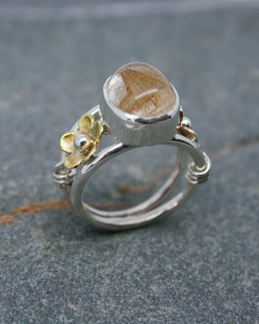 Cabochon rutilated quartz silver ring with bronze and brass detail