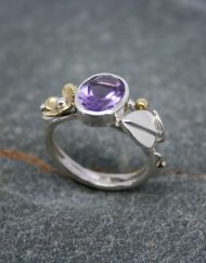 Handmade amethyst and silver ring with brass flower and silver leaf