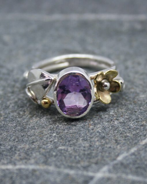 Handmade amethyst and silver ring with brass flower and silver leaf