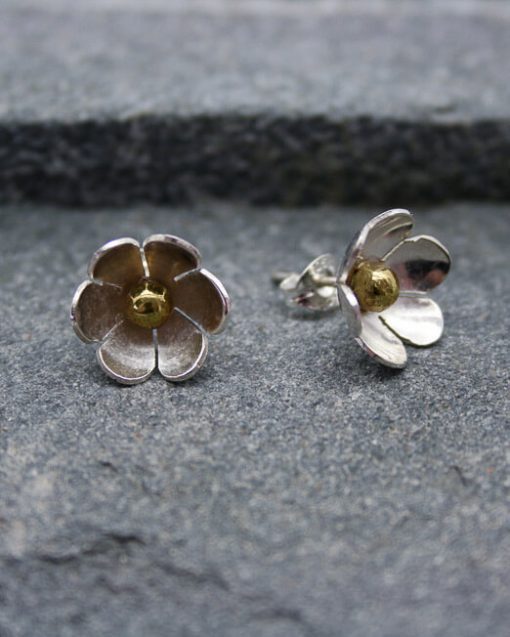 Silver daisy earrings with brass centres