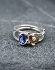 Silver Iolite ring with brass flower detail