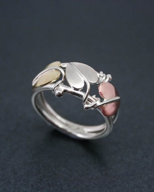 Silver, copper and brass three leaf ring
