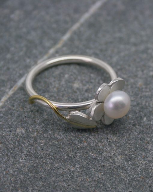 Silver and pearl flower ring with leaf and vine