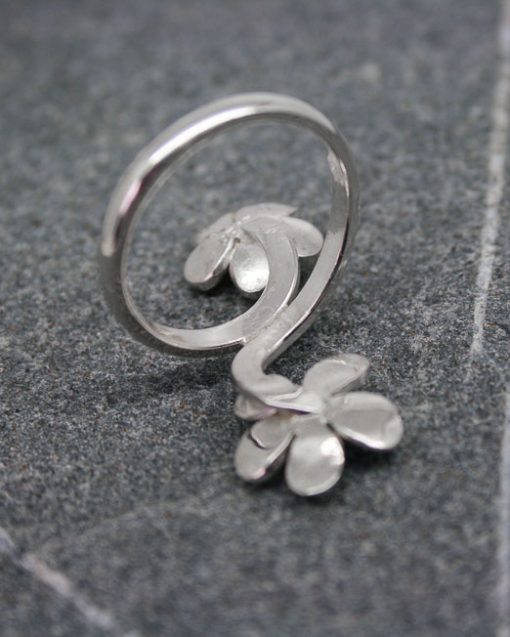 Silver daisy crossover ring with silver, copper or brass centres