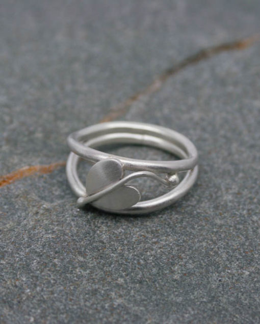 Sterling silver heart leaf ring on a double band