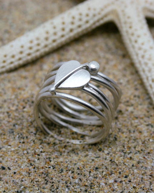 Wide sterling silver roller coaster ring with unique heart shaped leaf 1
